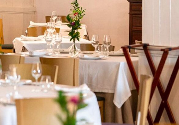Elegant restaurant dining room with set tables